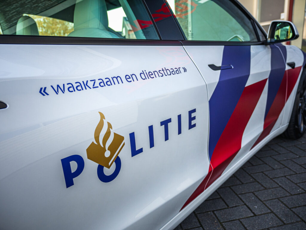 Tesla Model 3 in politielivery
